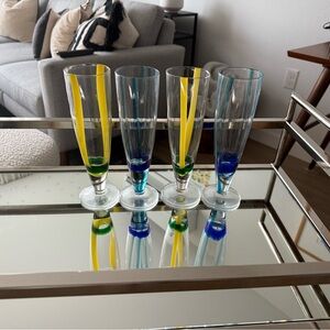Set of 4 Anthropologie champagne glasses
(2yellow/green & 2 blue)